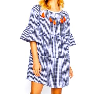 Small Mini Gingham Dress with Orange Tassel Detail.